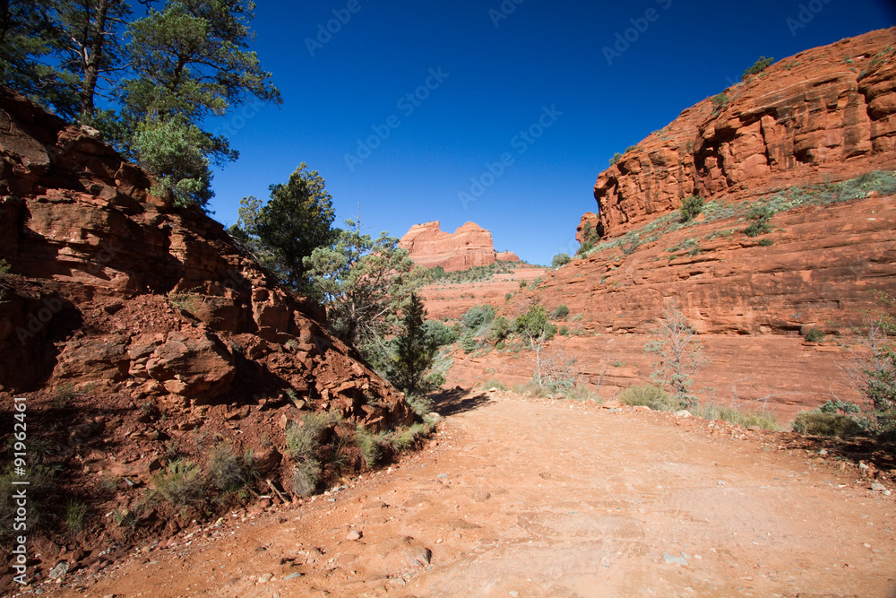 Rough-dirt Schnebly Hill Road runs through red-rock country near Sedona, Arizona