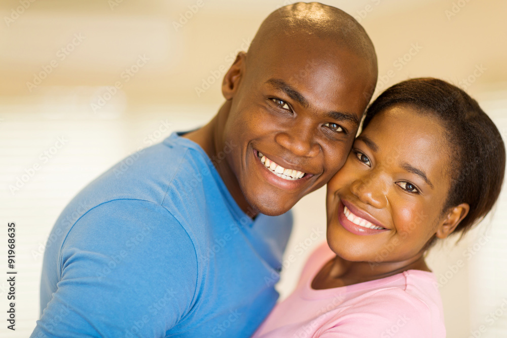 african couple looking at the camera african couple looking at the camera