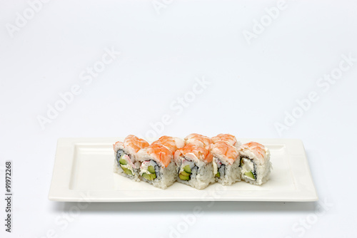 Sushi on white plate.