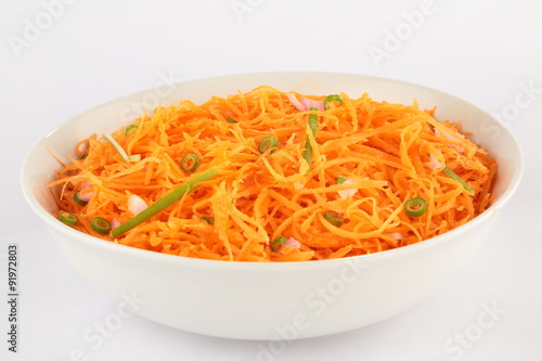 Tasty and spicy carrot spaghetti with ginger, garlic, chilli and lemon