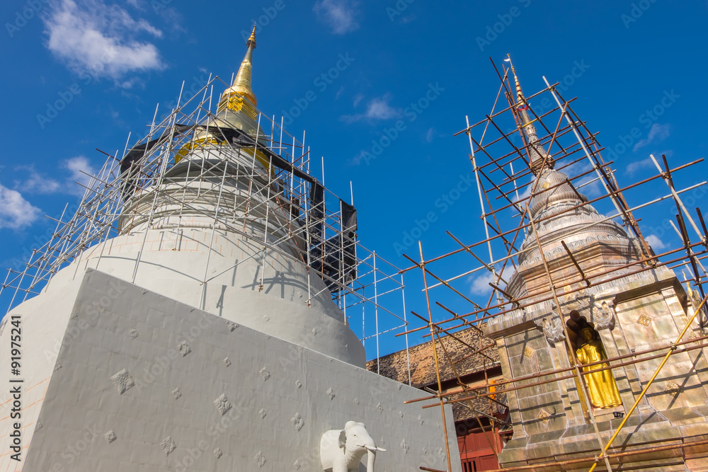 Repairing the pagoda at Wat Phra Sing in Chiang Mai, Thailand