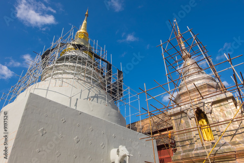 Obraz na płótnie Repairing the pagoda at Wat Phra Sing in Chiang Mai, Thailand w salonie