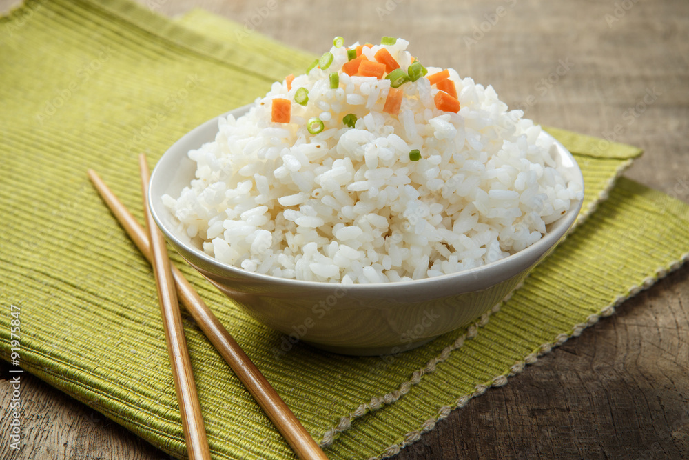 Japan rice with chopsticks on a fabric mat Japan rice with chopsticks on a fabric mat