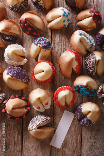 fortune cookies decorated with candy sprinkles closeup. vertical top view 