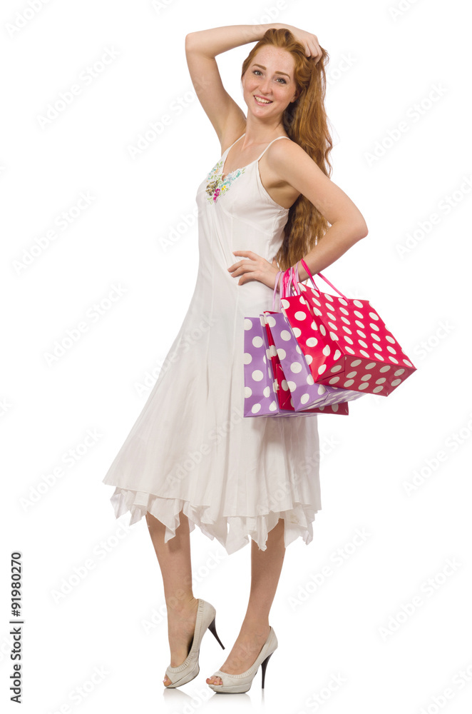 Woman with shopping bags isolated on white Woman with shopping bags isolated on white