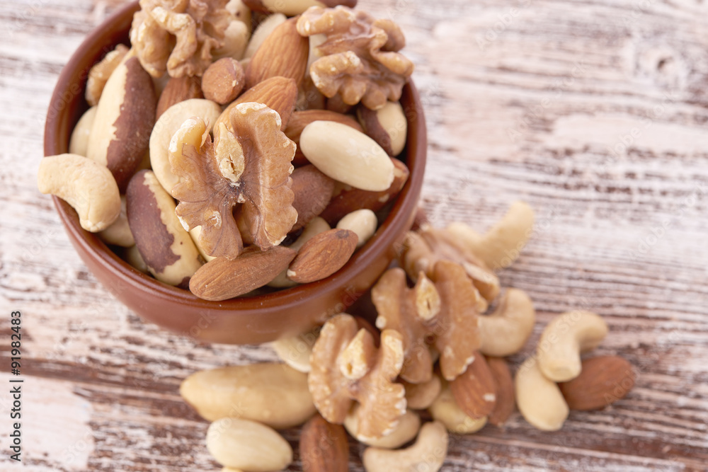 Mix nuts  on wooden background