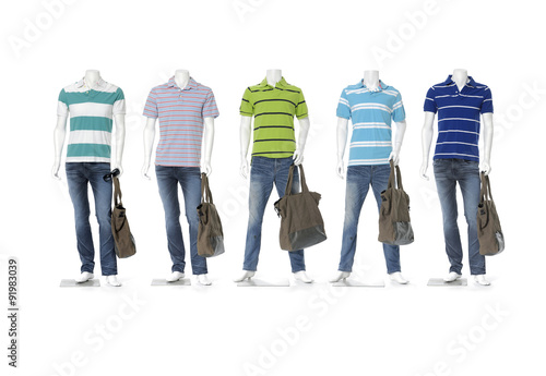 Five male mannequin dressed in jeans with colorful t-shirt 