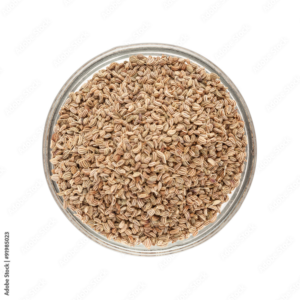Top view of Organic Ajwain (Trachyspermum ammi) in glass bowl isolated on white background. Top view of Organic Ajwain (Trachyspermum ammi) in glass bowl isolated on white background.