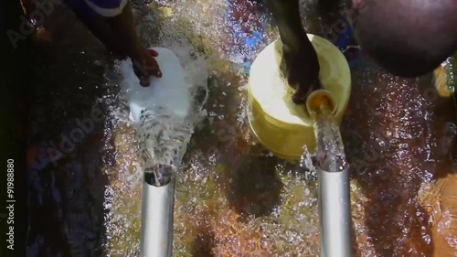 Filling Jugs at Spring Super Slow Motion