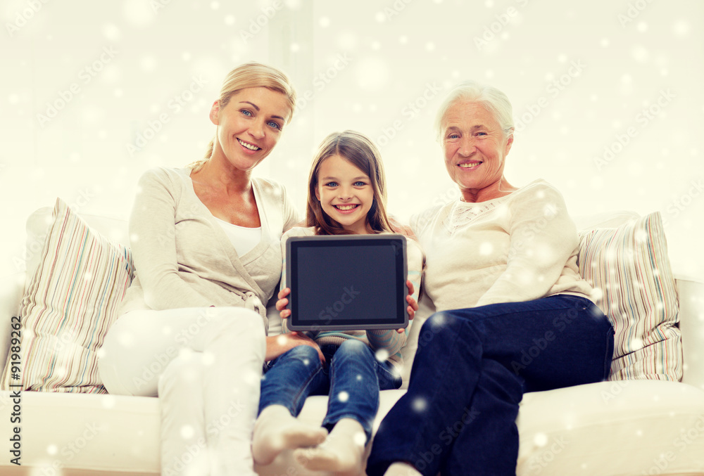 smiling family with tablet pc at home