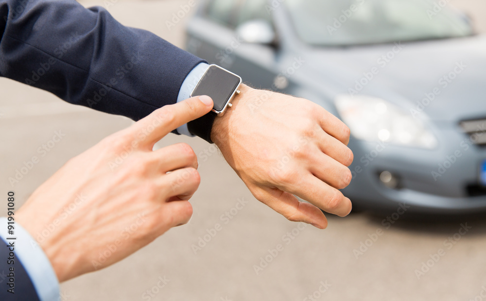close up of male hands with wristwatch and car close up of male hands with wristwatch and car