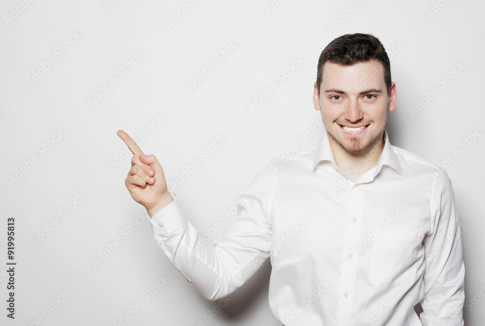 business man points with fingers in the right side business man points with fingers in the right side