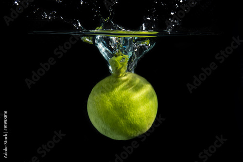 lemons dropped in water