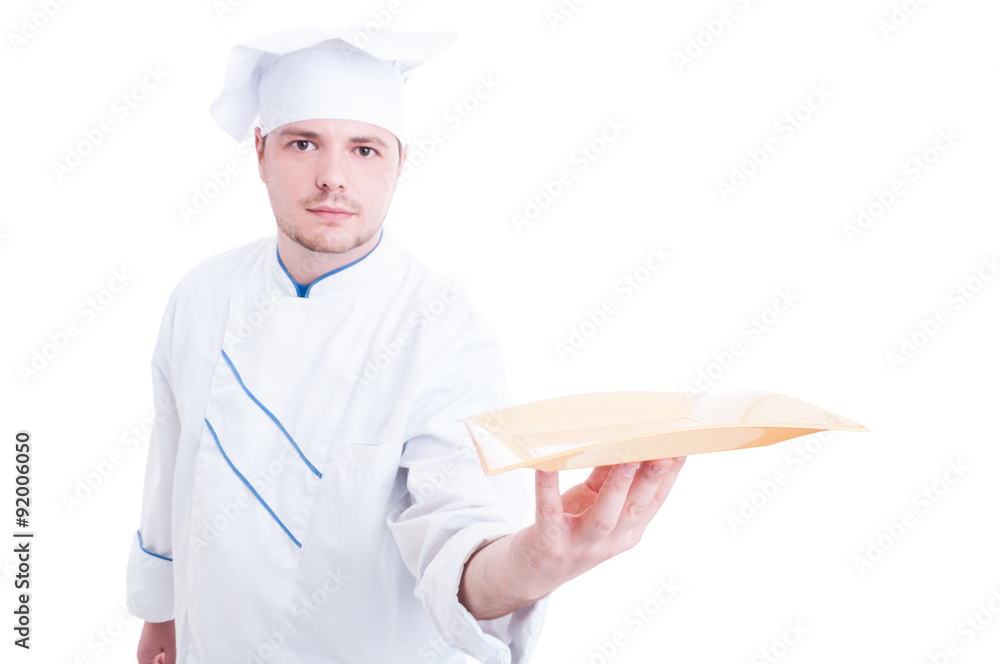 Cook or chef holding and presenting an empty plate Cook or chef holding and presenting an empty plate