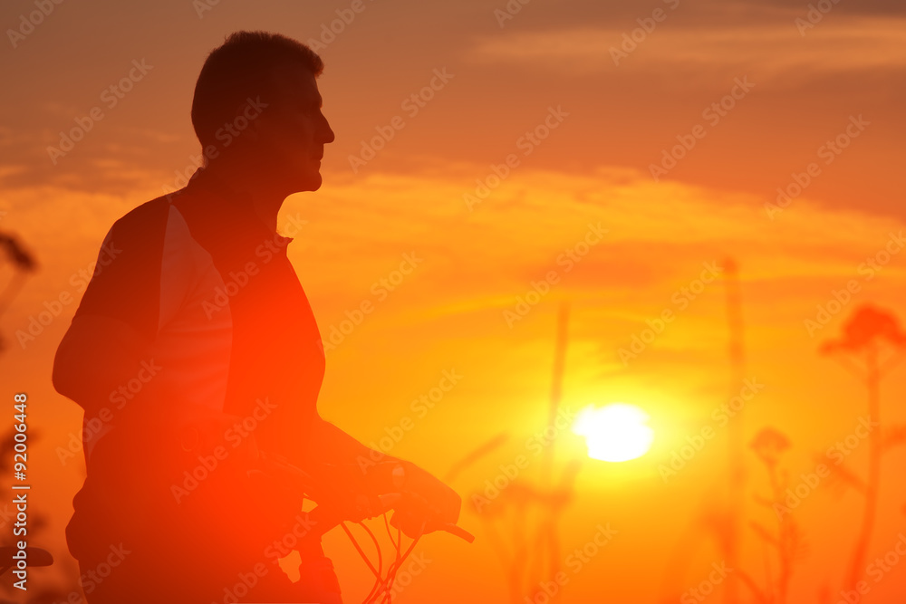 Fototapeta premium Man riding a bicycle in nature 