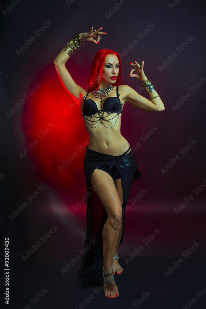 Bellydancer - Beautiful Woman in Sexy Clothing with Eastern Make Bellydancer - Beautiful Woman in Sexy Clothing with Eastern Make