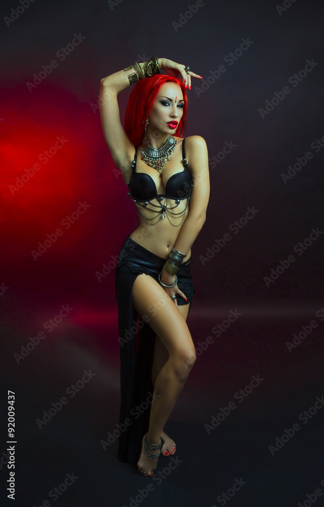 Bellydancer - Beautiful Woman in Sexy Clothing with Eastern Make Bellydancer - Beautiful Woman in Sexy Clothing with Eastern Make
