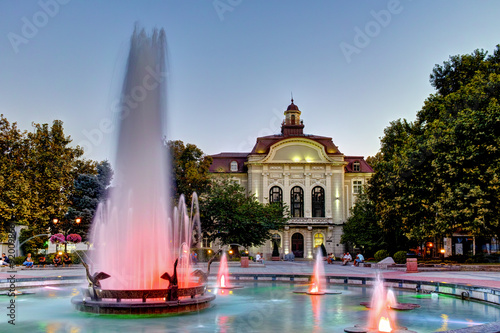 Building of city hall and Fountain in front at the center of City of Plovdiv, Bulgaria photo