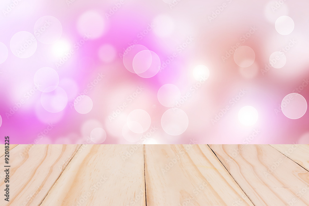 Wooden table with Pink bokeh Wooden table with Pink bokeh
