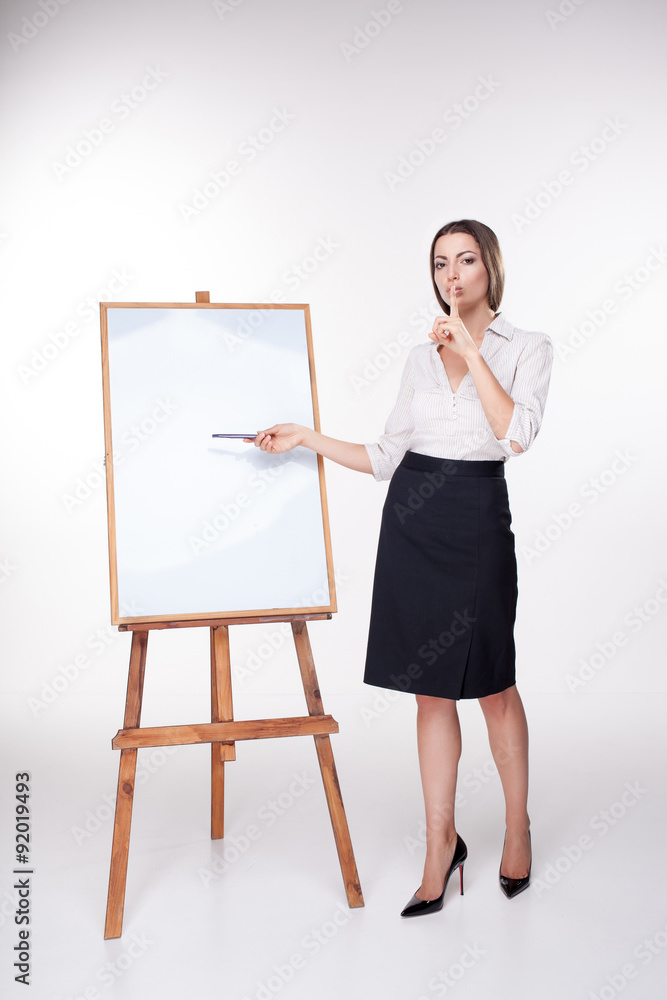 young business woman showing something on the white background young business woman showing something on the white background
