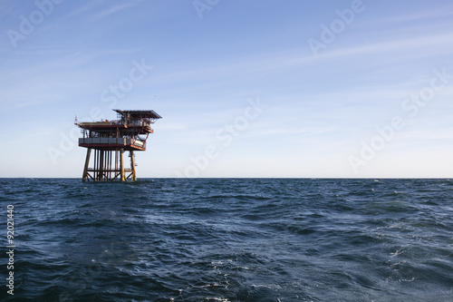 Oil production platform at sunny day © Lukasz Z