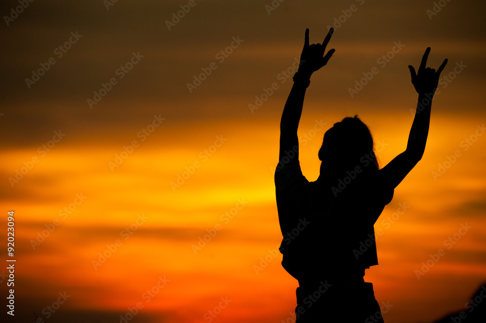 Silhouette girl show hands love sign. Silhouette girl show hands love sign.