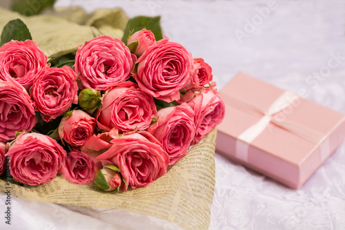 Wedding bouquet of beautiful pink roses with gift box for jewelry
