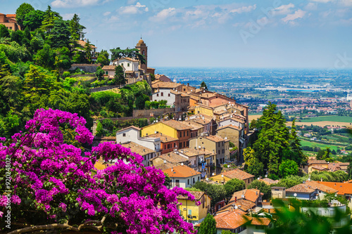 landscape with roofs of houses in small tuscan town in province