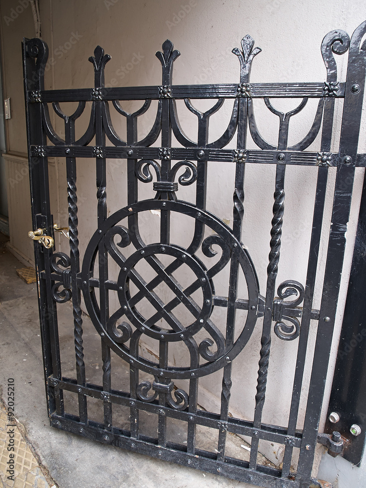 Classical design black wrought iron gate Stock Photo | Adobe Stock