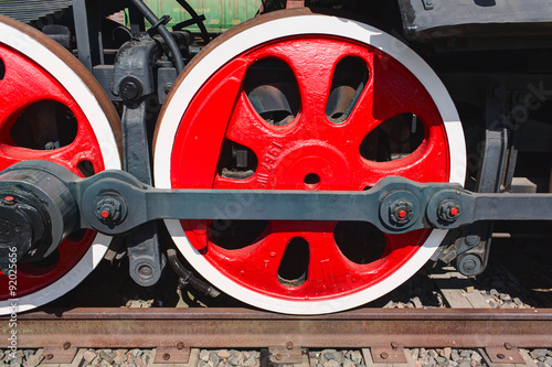 Old steam locomotive painted wheels.