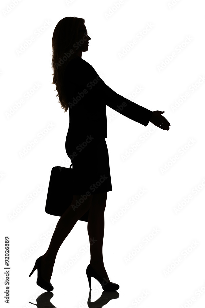 silhouette of a busy business woman backlight studio silhouette of a busy business woman backlight studio