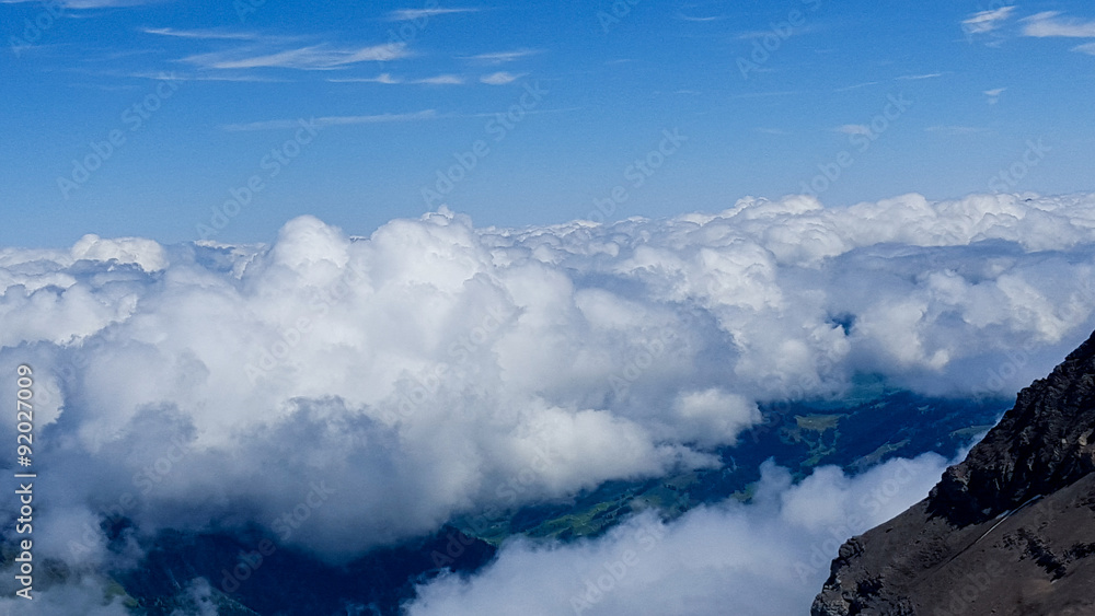 Cloud filled sky just across the mountains Cloud filled sky just across the mountains