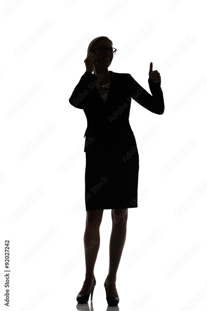 silhouette of a busy business woman backlight studio silhouette of a busy business woman backlight studio