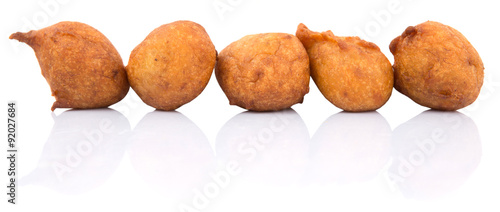 Popular Malaysian fritter snack deep fried banana balls or locally known as Cekodok Pisang photo