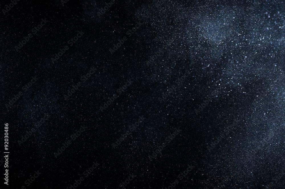 abstract white dust explosion on black background. abstract white powder explosion on black background. abstract texture.