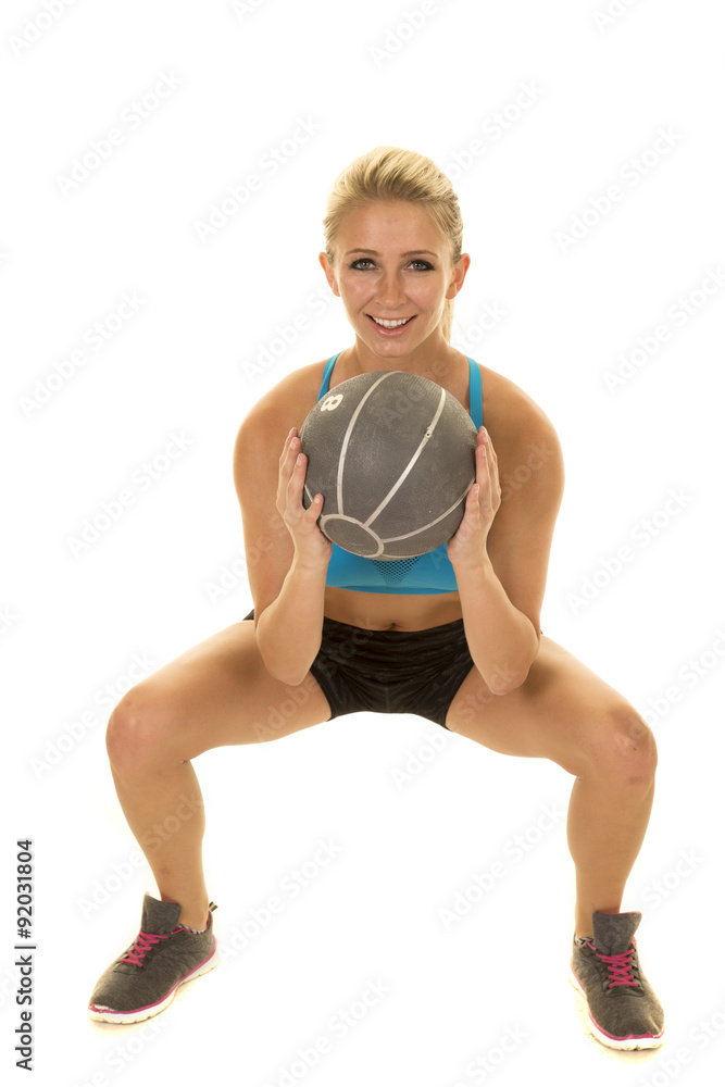 blond woman blue sports bra squat ball front look blond woman blue sports bra squat ball front look