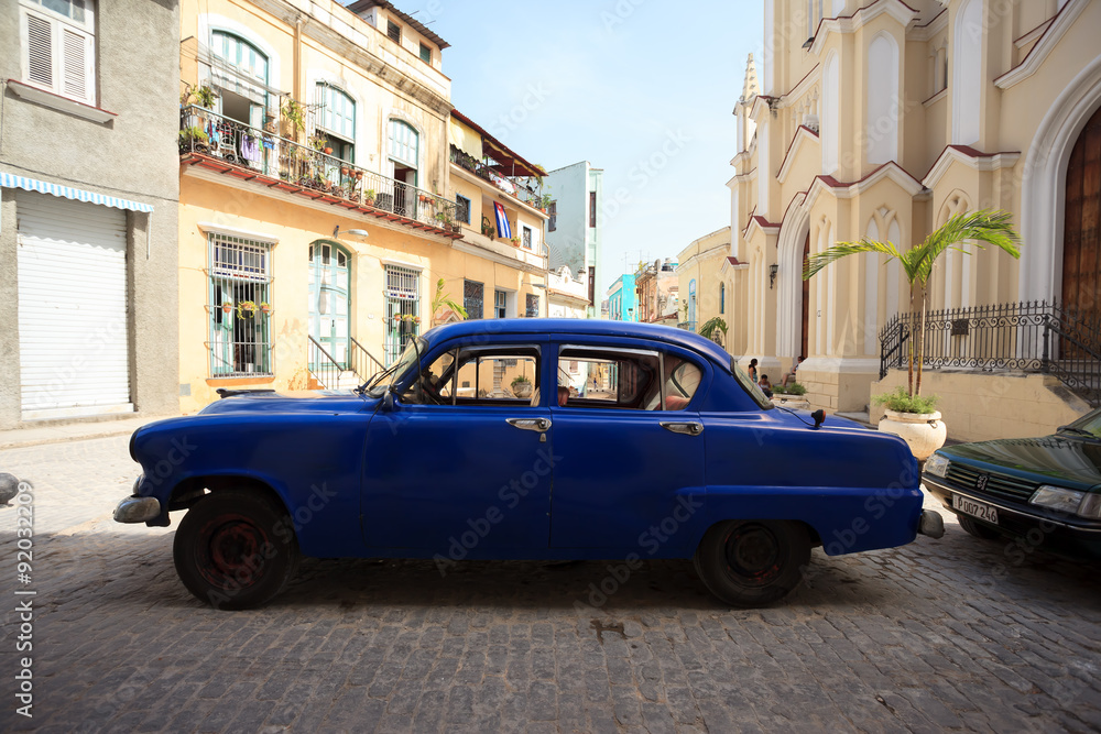 Vintage car parked in the street of old havana, cuba