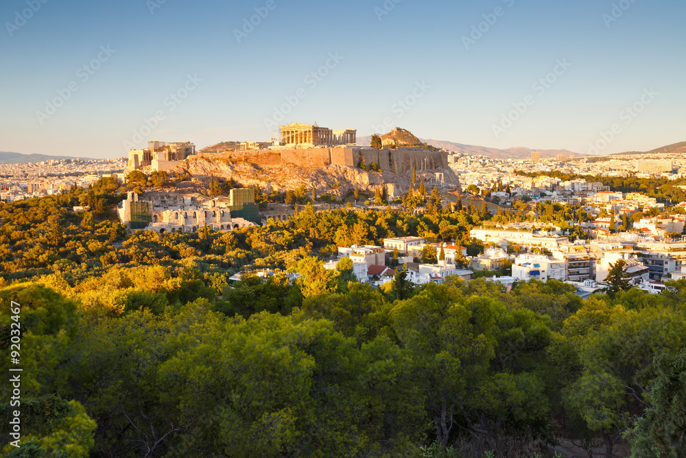 Evening view of Acropolis from Filopappou hill in central Athens.