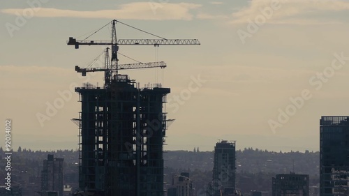 Skyscraper Under Construction In Moody Lighting
