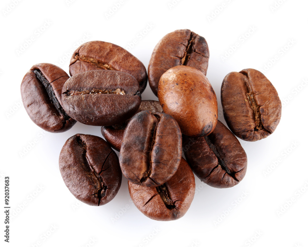 Brown coffee beans isolated on white Brown coffee beans isolated on white