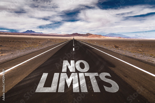 No Limits written on desert road photo