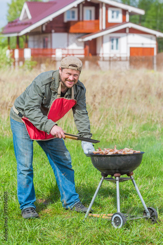 Man preparing barbecue