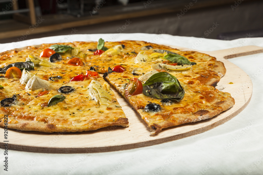 Vegetarian pizza ready to serve. Vegetarian pizza ready to serve.