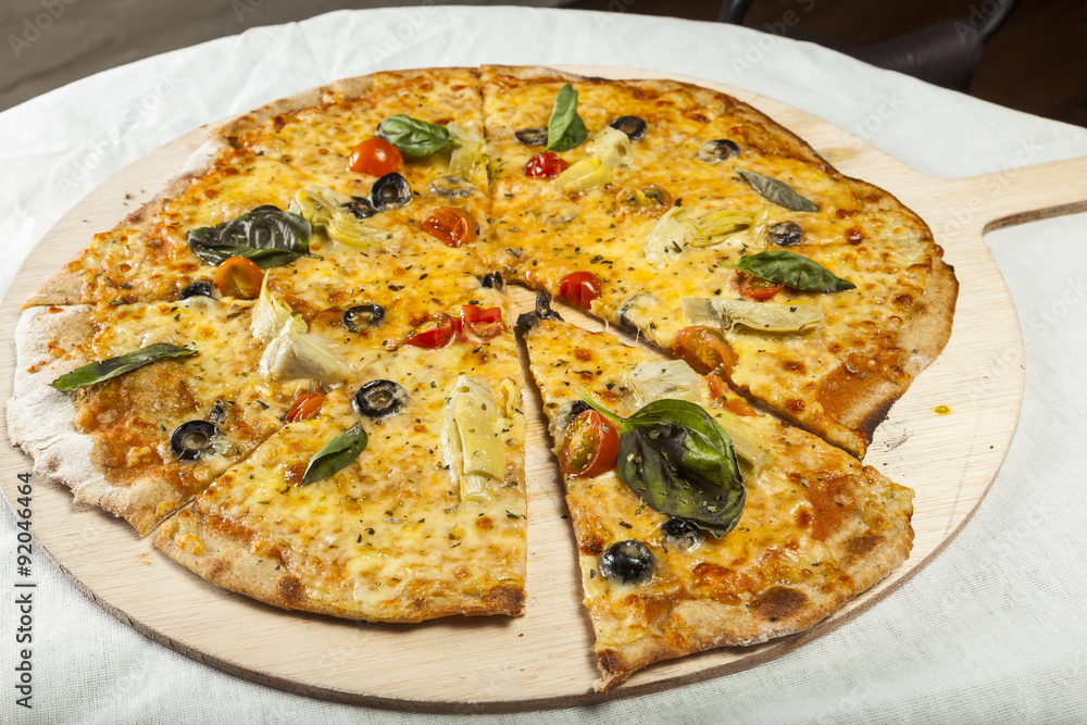 Vegetarian pizza ready to serve. Vegetarian pizza ready to serve.
