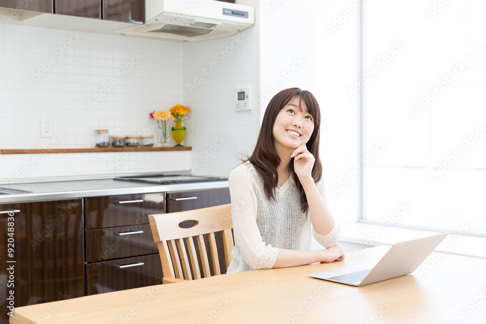young asian womman using laptop young asian womman using laptop