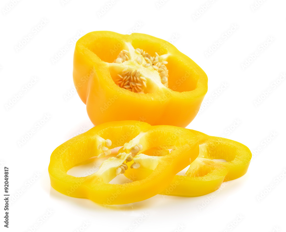 Sliced yellow paprika pepper isolated on white background