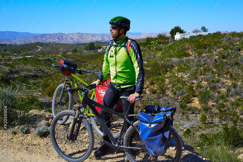 Obraz premium cycling tourist cyclist in Pedralba Valencia with paniers