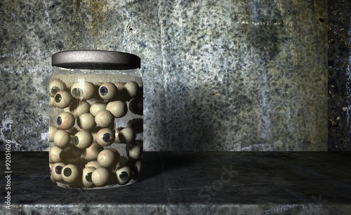 Jar of eyeballs in liquid photo