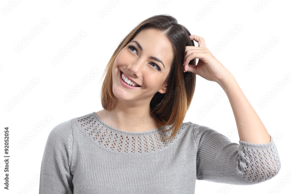 Pensive woman thinking and looking at side Pensive woman thinking and looking at side