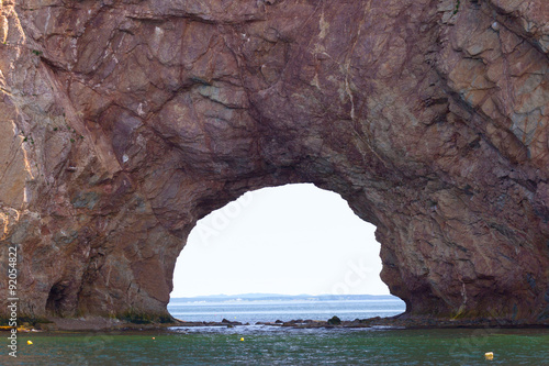 Perce Rock, Perce, Gaspe, Peninsula, Quebec, Canada  Perce Rock is one of the world's largest natural arches located in water. © JHVEPhoto